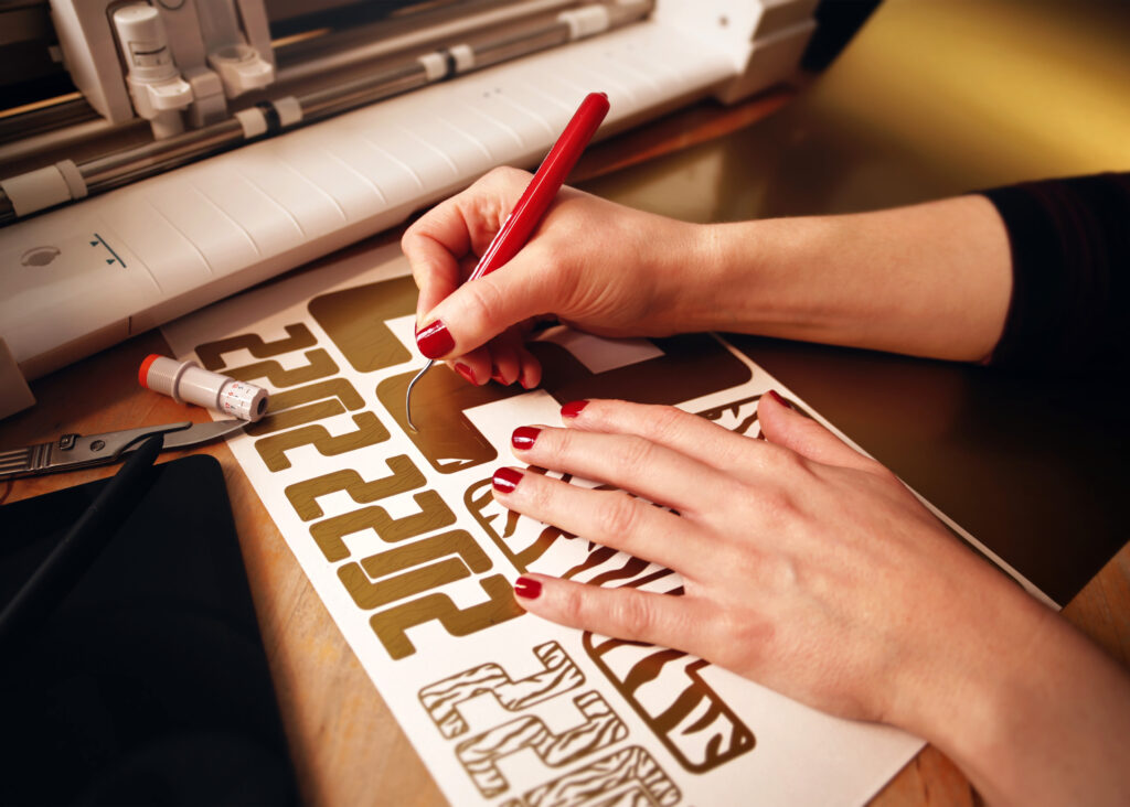 Comparing DTG to Alternative Printing Methods 6 Weeding Heat Transfer Vinyl